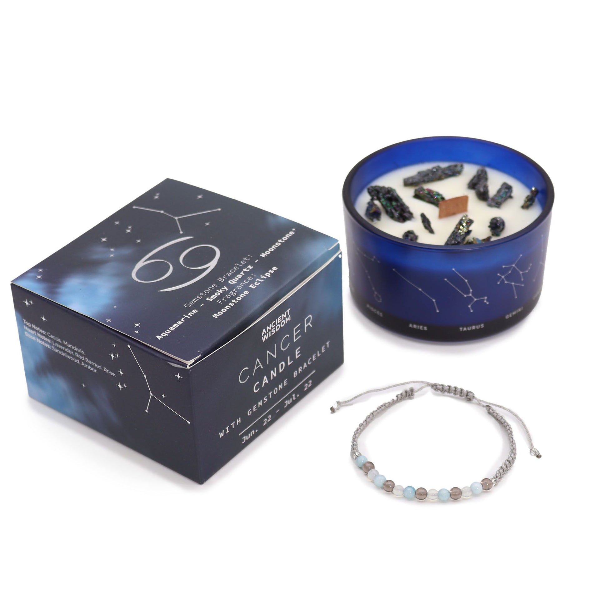 Cancer candle with jewelry set on a white background