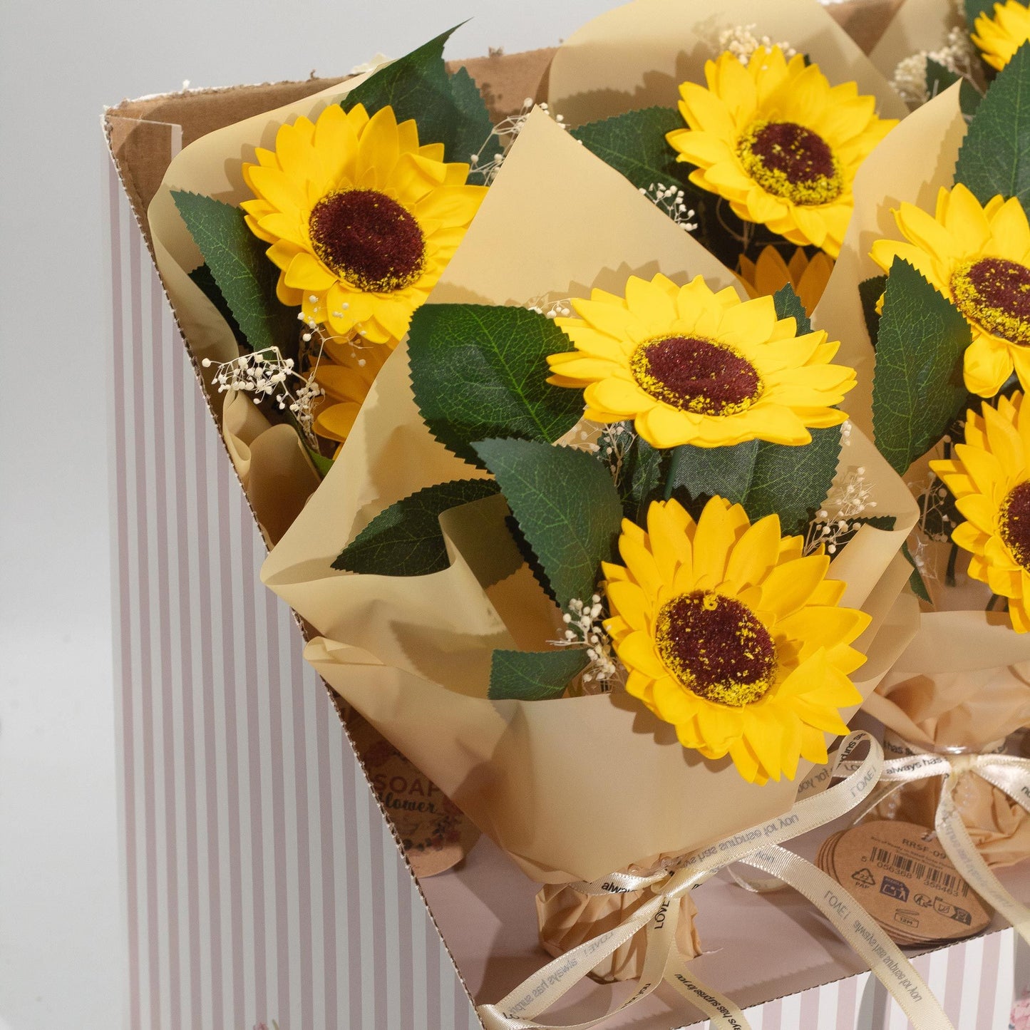Detail of lifelike soap sunflower petals with bright yellow colour and natural centre detail