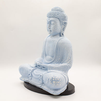 Meditation Buddha Lamp with crackle textured surface on modern oval stand