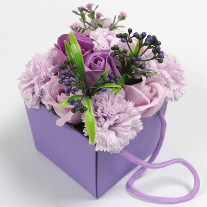 Luxury soap flower bouquet featuring realistic lavender roses and carnations, artistically arranged in elegant gift packaging with ribbon, presented as bath blooms