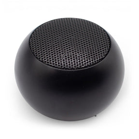 Palm-sized Beyond Size mini Bluetooth speaker in sleek modern design held in hand, showing compact scale, one-button control and subtle LED indicator
