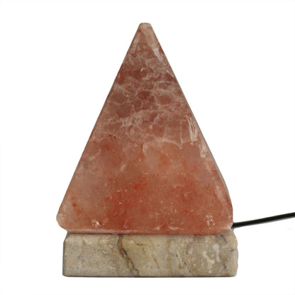 Glowing pink pyramid Himalayan salt lamp on wooden base with USB cable