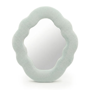 Soft squiggly cloud mirror in serene Cloud Blue velvet frame with smooth rounded silhouette