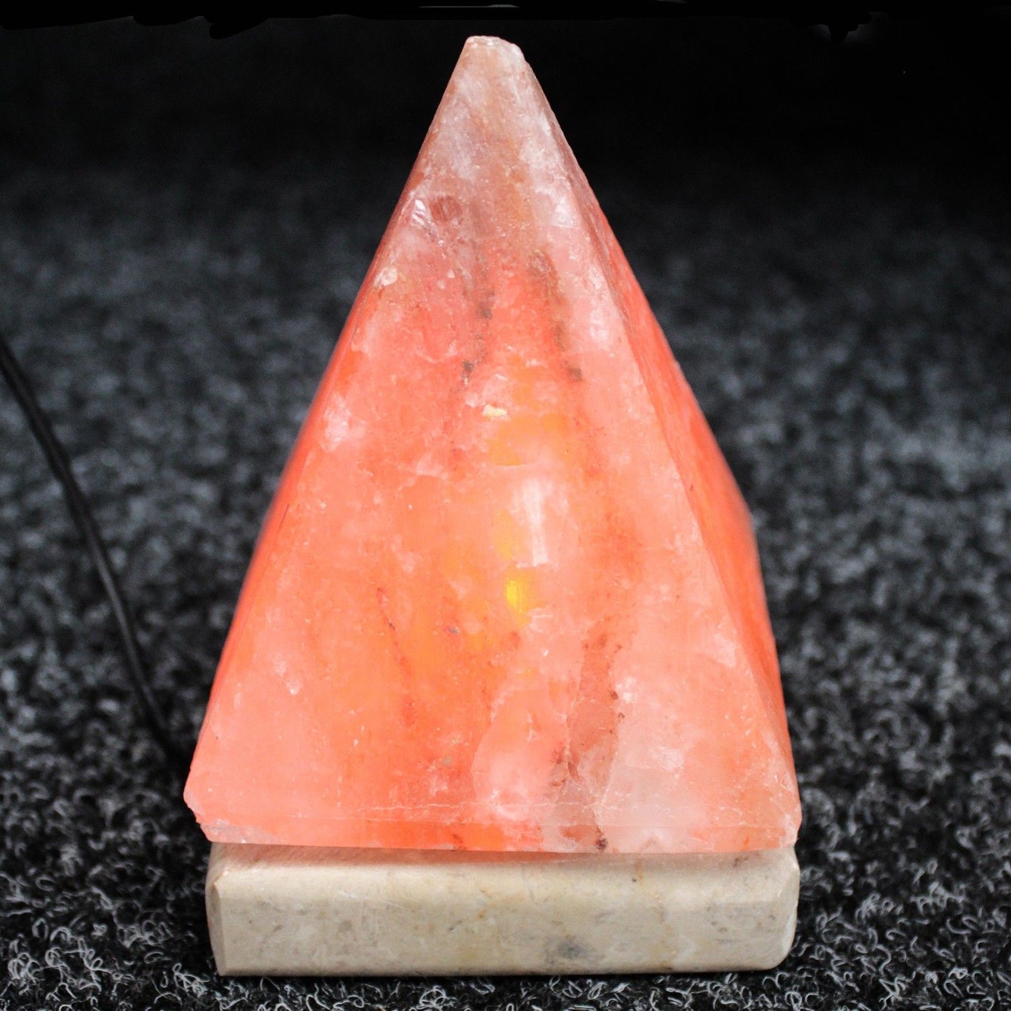 Tapered crystal lamp with a warm glow 