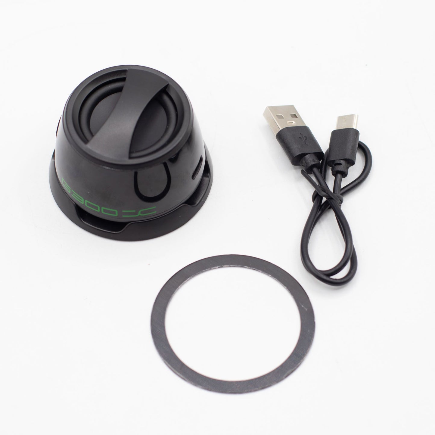 Close-up of G300 speaker showing magnetic attachment, 5W speaker grille, top controls and LED lighting detail