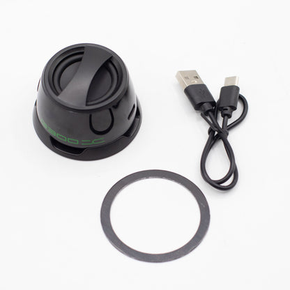 Close-up of G300 speaker showing magnetic attachment, 5W speaker grille, top controls and LED lighting detail