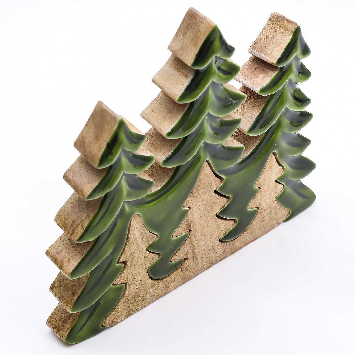 20×23cm 3D mango wood three pine trees decoration with deep green enamel branches on wooden base, styled on winter mantel with fairy lights and snow