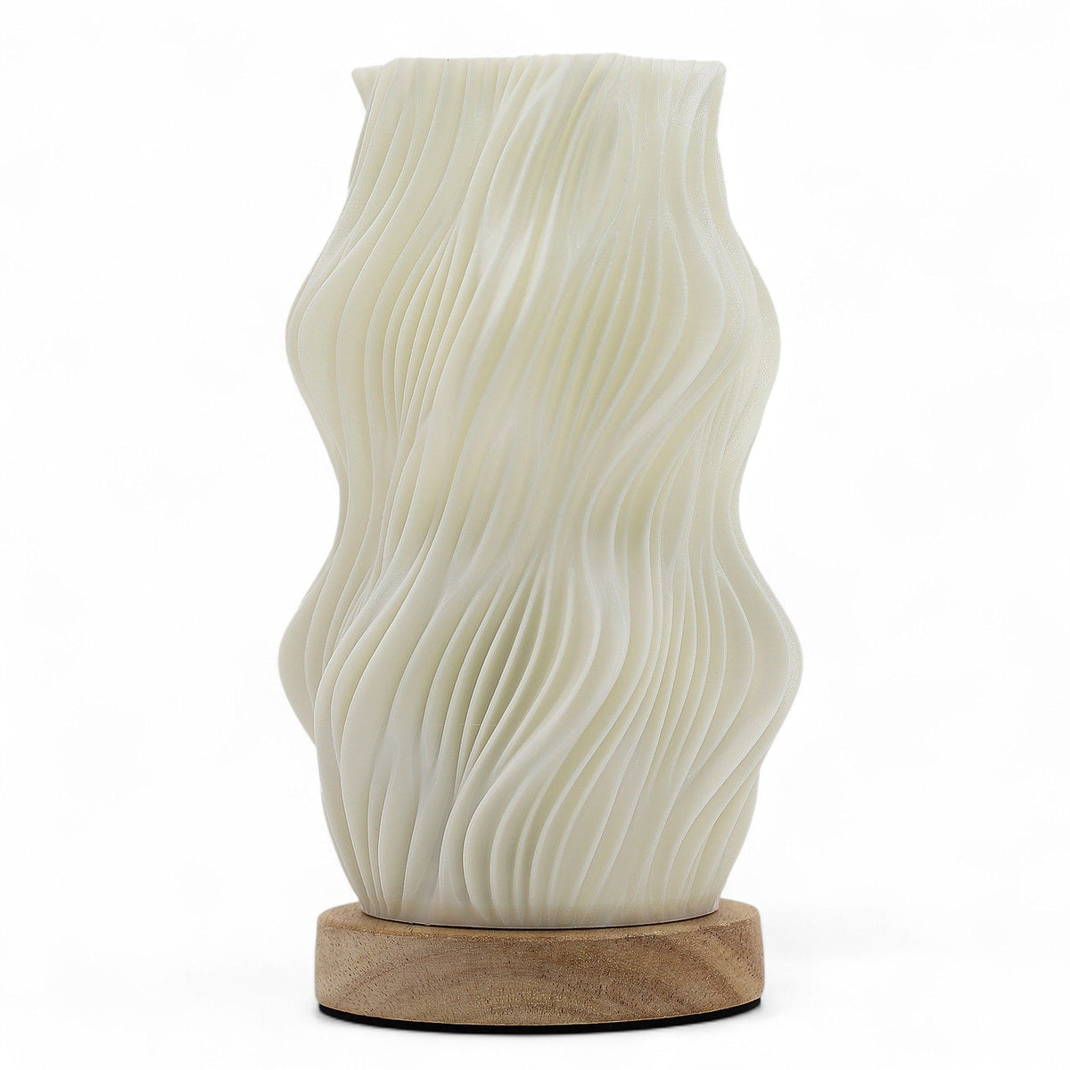 Star Twisted New Wave USB-C lamp with textured honeycomb surface and elegant star-inspired twisted shape, warm glow on 3rd brightness setting, placed on wooden base