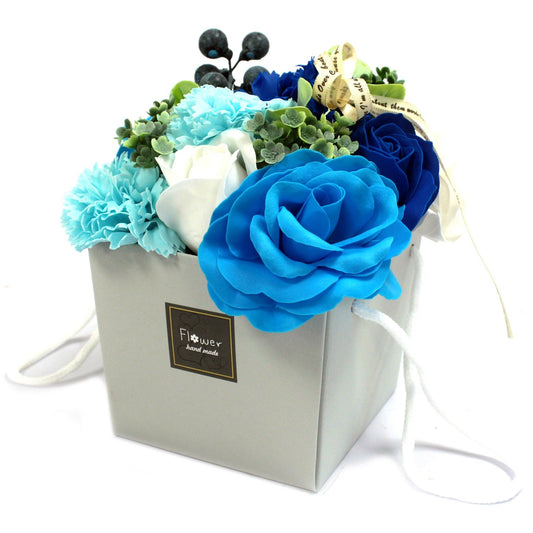Blue Wedding soap flower bouquet with lifelike pale blue roses, hydrangeas and delicate blooms artistically arranged in elegant gift packaging with satin ribbon, presented as luxury bath gift