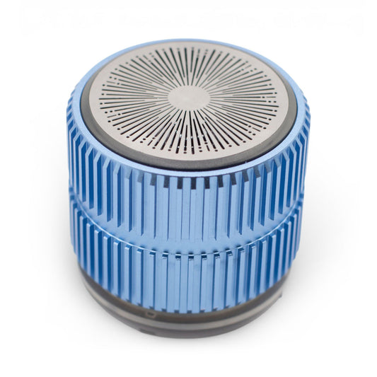 Mint Rock Mini Bluetooth Speaker in cool mint tone with textured rock-inspired metal-style body, compact size 